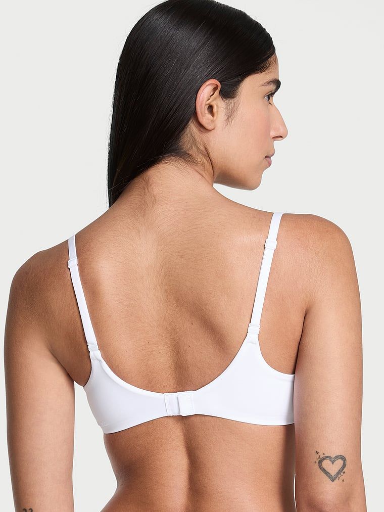 Biustonosz lekko usztywniany FlexFactor Demi. Produkt ma kolor biały i pochodzi z kolekcji Body by Victoria. 