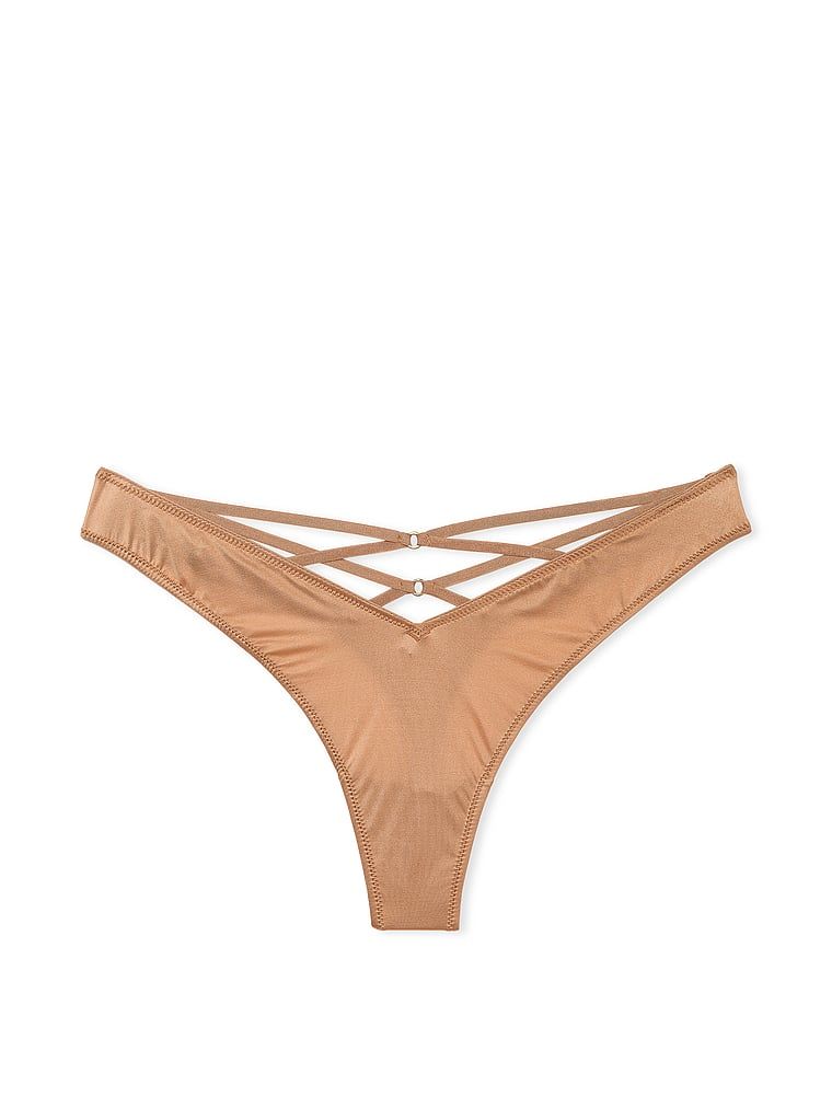 Stringi z paseczkami z tyłu i wysoko wyciętymi nogawkami Strappy-Back High-Leg. Produkt ma kolor beżowy i pochodzi z kolekcji Very Sexy. 