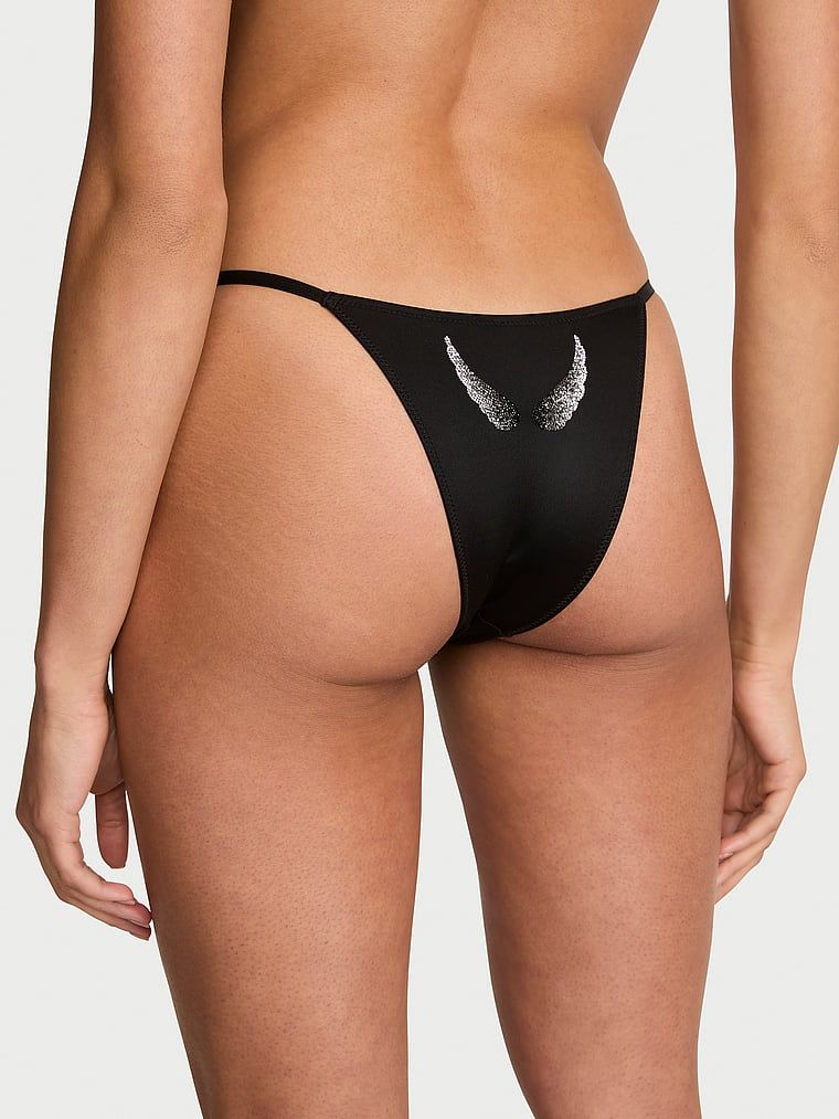 Majtki brazyliany ze skrzydełkami Angel Shine. Produkt ma kolor czarny i pochodzi z kolekcji Very Sexy. 