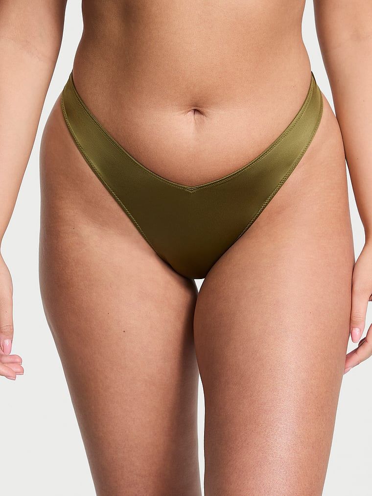 Stringi z paseczkami z tyłu i wysoko wyciętymi nogawkami Strappy-Back High-Leg. Produkt ma kolor zielony i pochodzi z kolekcji Very Sexy. 