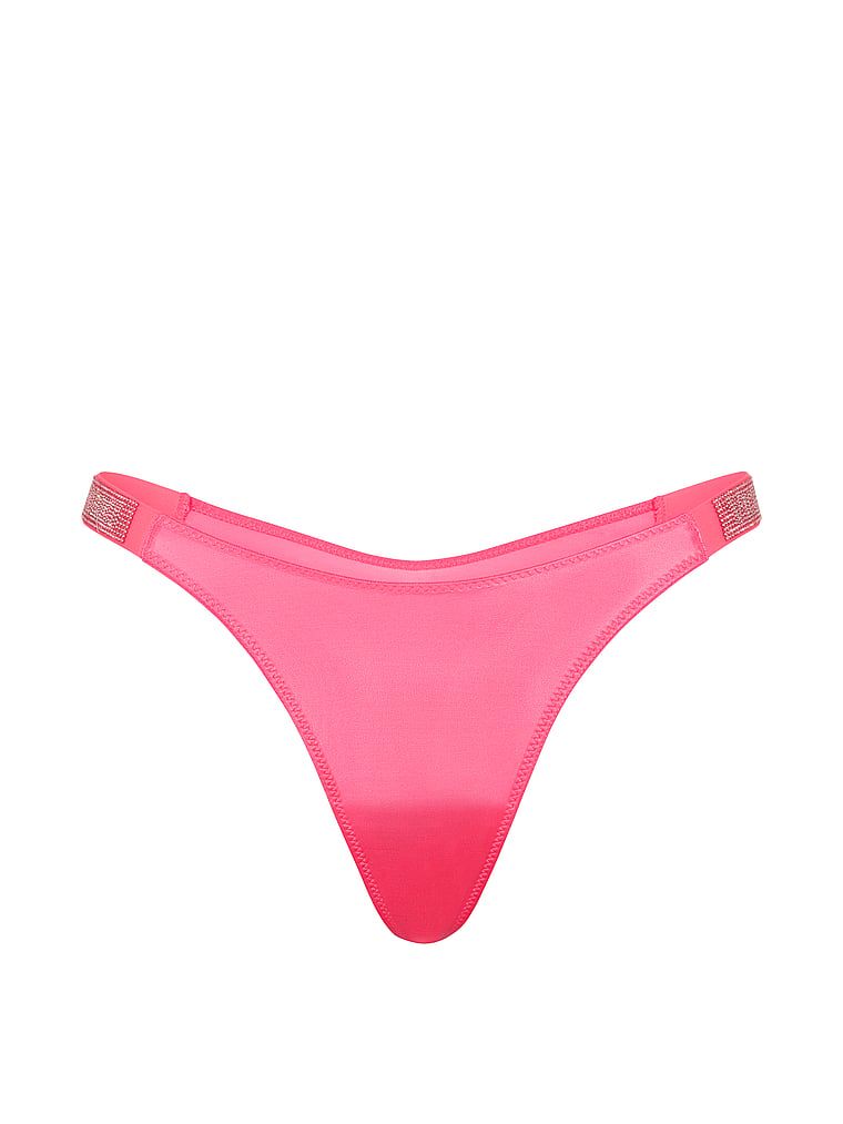 Stringi z błyszczącymi paskami Shine Strap. Produkt ma kolor różowy i pochodzi z kolekcji Very Sexy. 