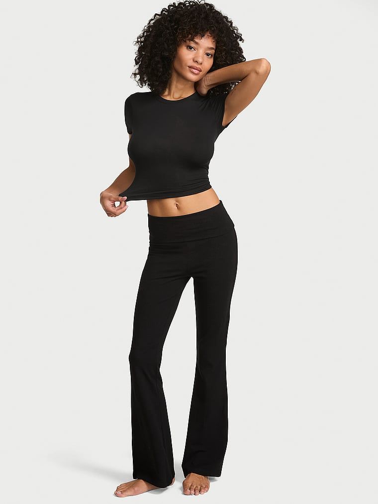 Legginsy bawełniane Foldover Flare. Produkt ma kolor czarny i pochodzi z kolekcji Angel Essentials. 