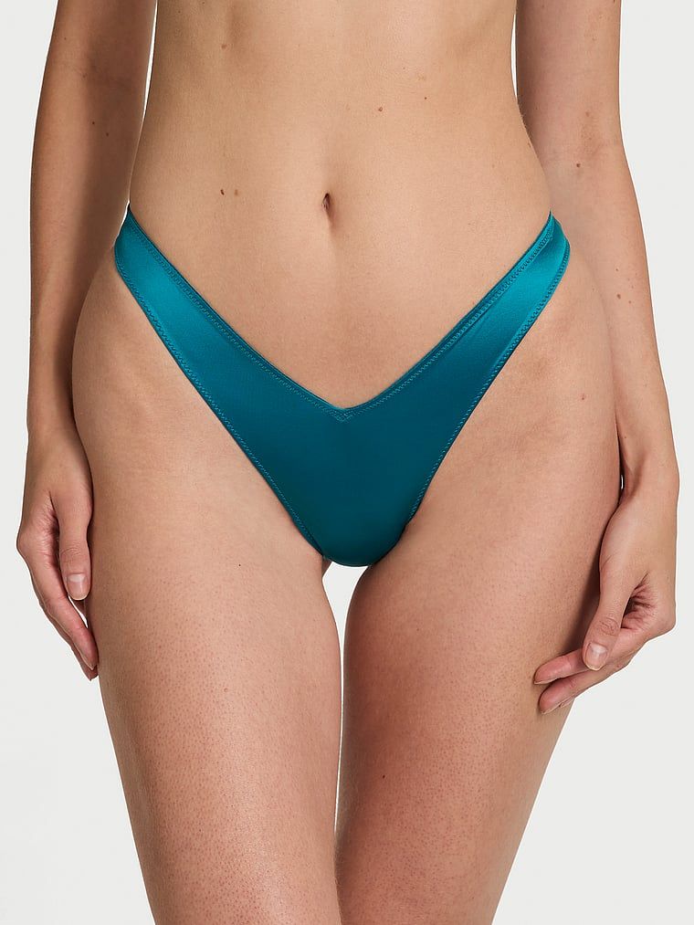 Stringi z paseczkami z tyłu i wysoko wyciętymi nogawkami Strappy-Back High-Leg. Produkt ma kolor zielony i pochodzi z kolekcji Very Sexy. 