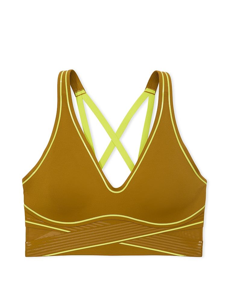Na zdjęciu na białym tle widoczny jest biustonosz sportowy z lekkim wsparciem i dekoltem VSX Elevate Refined Contours. Produkt ma kolor zielony i pochodzi z kolekcji VSX.