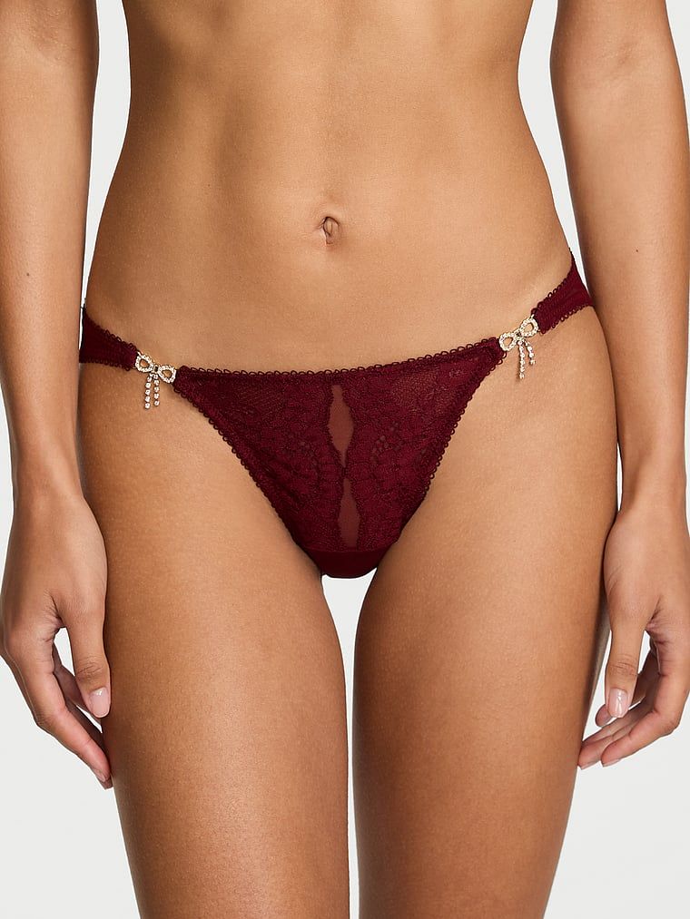 Majtki koronkowe z błyszczącymi kokardkami Twinkle Bows Bikini. Produkt ma kolor czerwony i pochodzi z kolekcji Dream Angels. 
