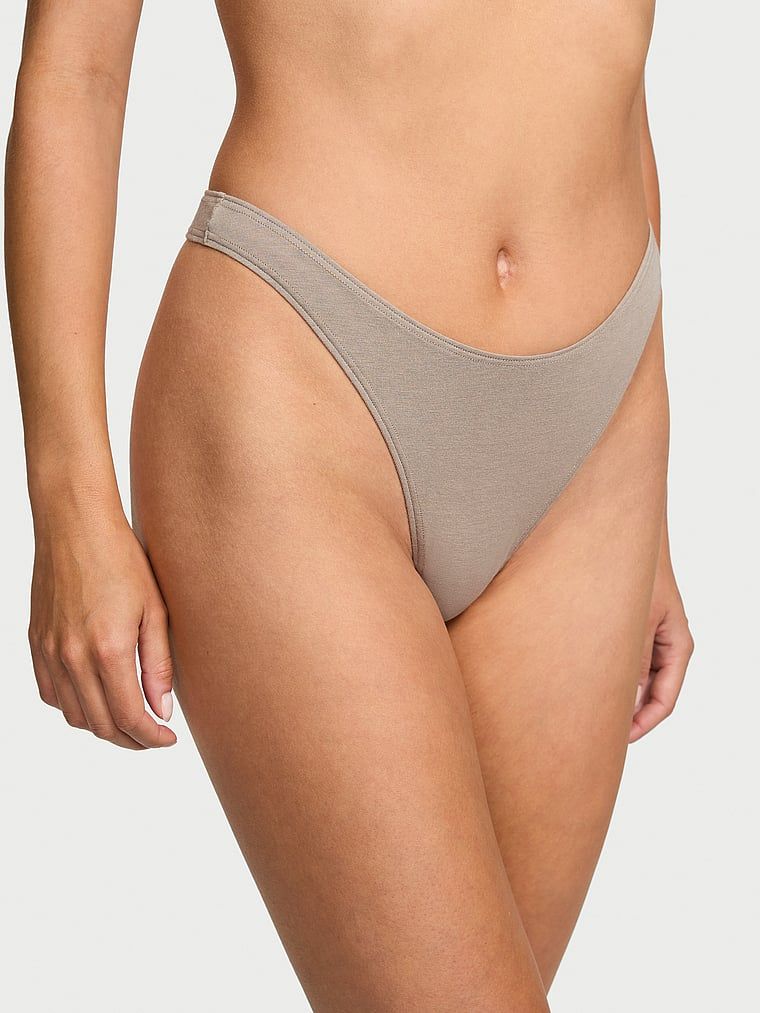 Stringi bawełniane High-Leg Scoop. Produkt ma kolor beżowy i pochodzi z kolekcji Victoria's Secret. 