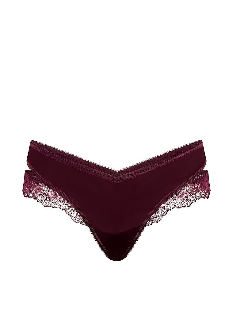 Stringi z koronką i wycięciami po bokach Cut-Out. Produkt ma kolor różowy i pochodzi z kolekcji Very Sexy. 
