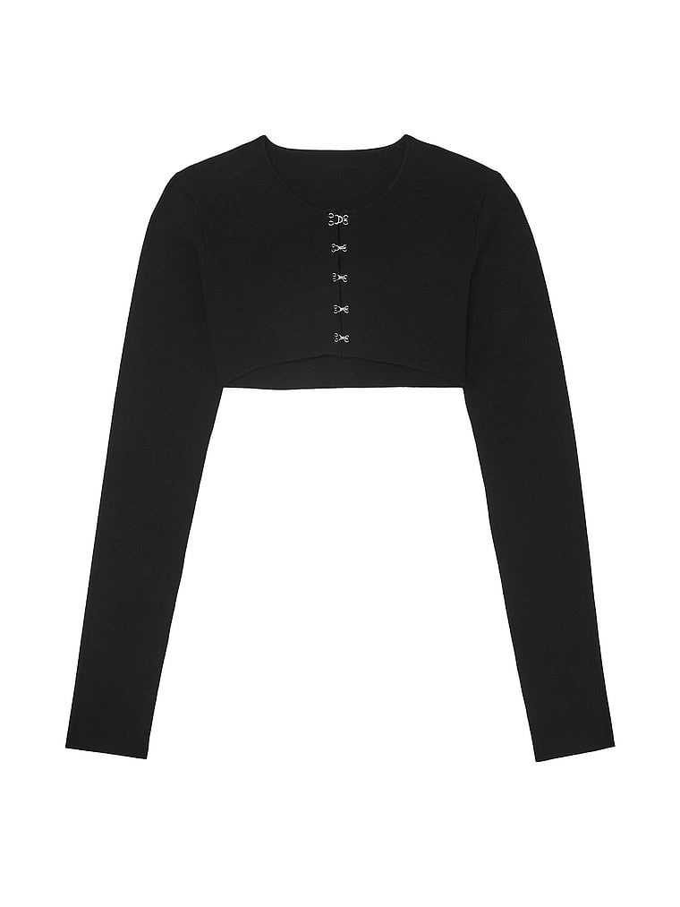 Sweterek kardigan krótki zapinany na haftki Atelier X Altuzarra. Produkt ma kolor czarny i pochodzi z kolekcji Atelier Victoria's Secret x Altuzarra. 