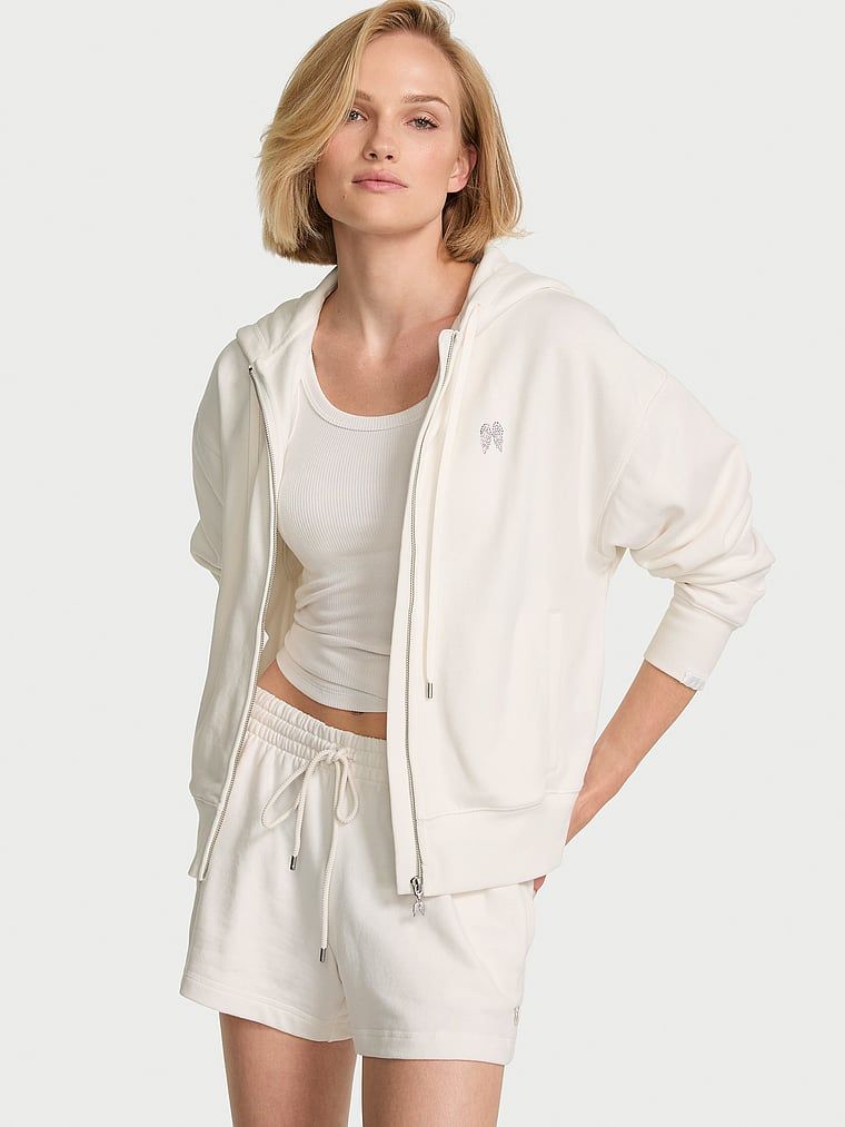 Bluza bawełniana z kapturem i suwakiem dla Panny Młodej Iconic Bride. Produkt ma kolor biały i pochodzi z kolekcji Angel Essentials. 