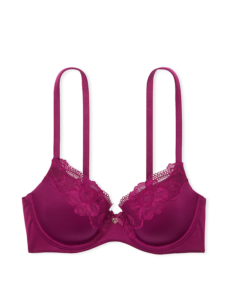 Na zdjęciu na białym tle widoczny jest biustonosz lekko usztywniany z koronką Lace-Trim Demi. Produkt ma kolor czerwony i pochodzi z kolekcji Body by Victoria.