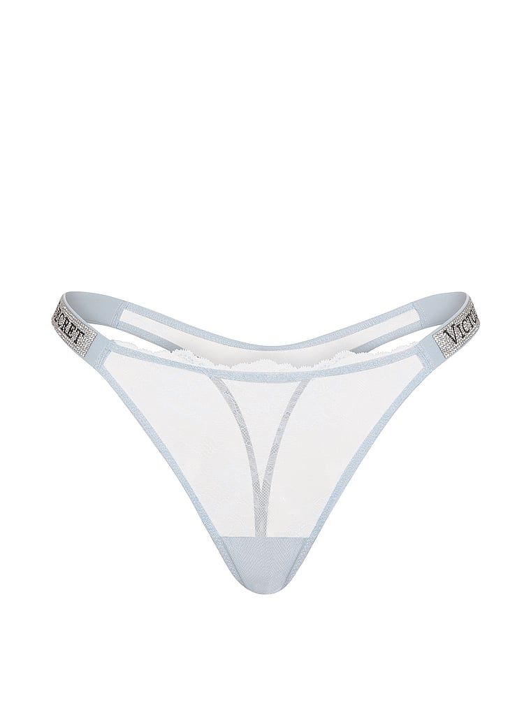 Stringi koronkowe z błyszczącymi paskami Shine Strap. Produkt ma kolor niebieski i pochodzi z kolekcji Very Sexy. 
