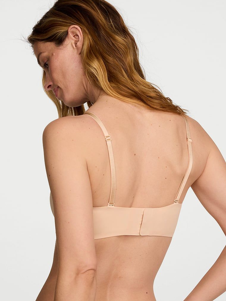 Biustonosz lekko usztywniany bez ramiączek Sweetheart Strapless. Produkt ma kolor beżowy i pochodzi z kolekcji Invisible by Victoria's Secret. 