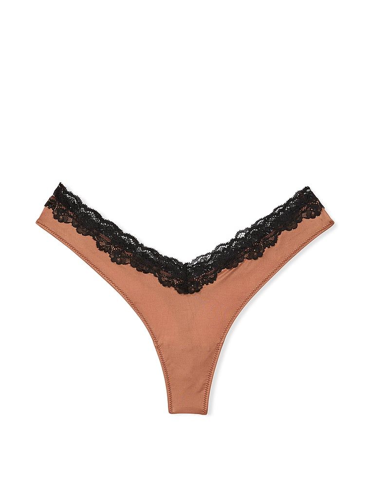Stringi z koronką i wysoko wyciętymi nogawkami Lace-Trim High-Leg. Produkt ma kolor brązowy i pochodzi z kolekcji Very Sexy. 