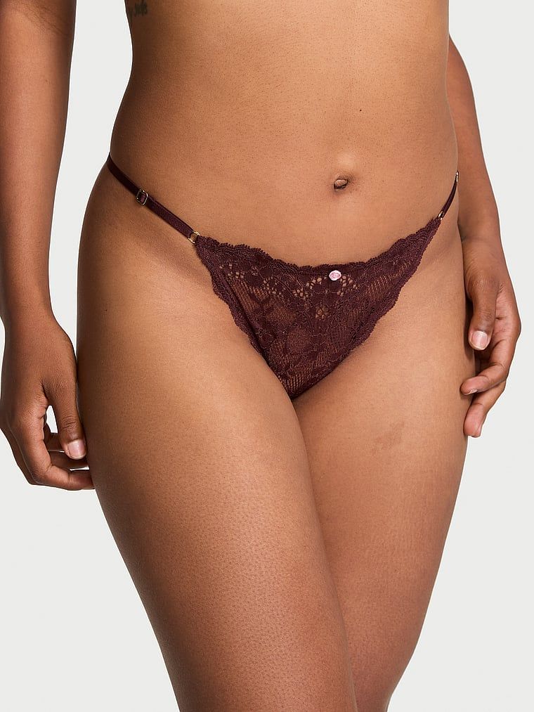 Majtki koronkowe z regulowanymi paskami Bikini. Produkt ma kolor czerwony i pochodzi z kolekcji Dream Angels. 
