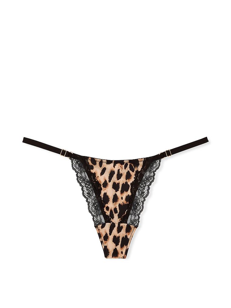 Stringi z regulowanymi paseczkami Lace-Trim. Produkt ma wzór z motywem zwierzęcym i pochodzi z kolekcji Very Sexy. 