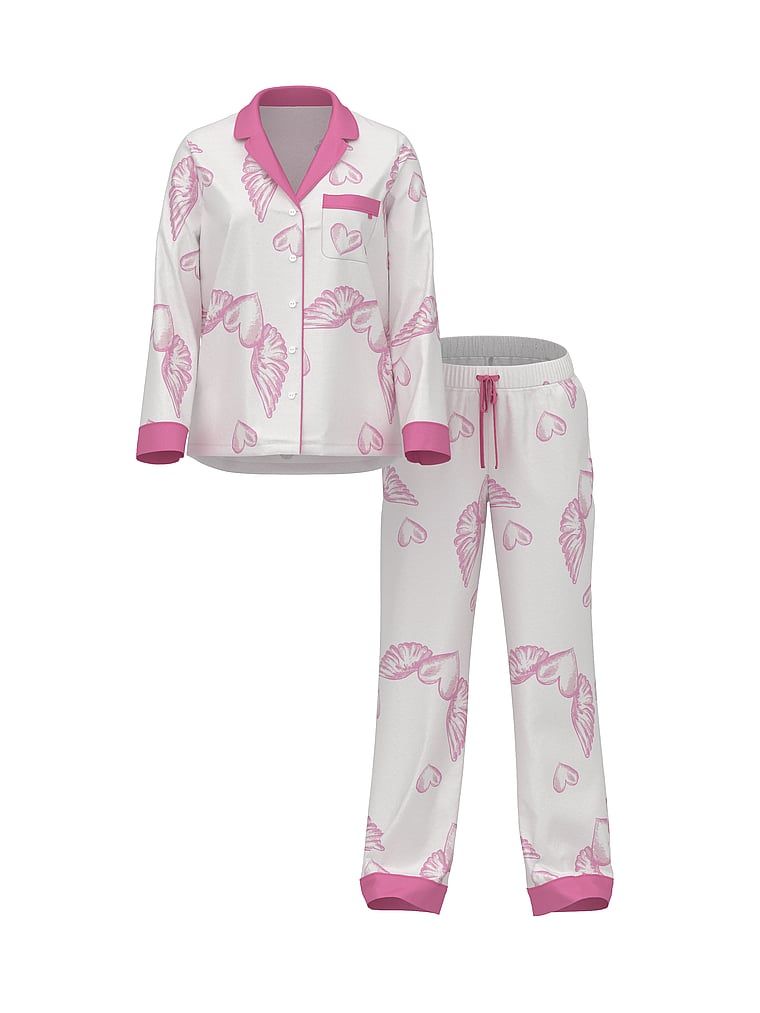 Satynowa piżama z długimi rękawami. Produkt jest wzorzysty i pochodzi z kolekcji Victoria's Secret. 