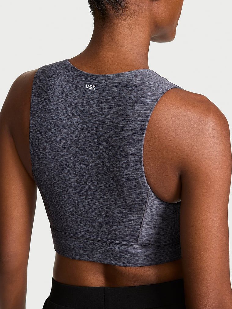 Biustonosz sportowy top VSX New Essential. Produkt ma kolor wzorzysty i pochodzi z kolekcji VSX. 