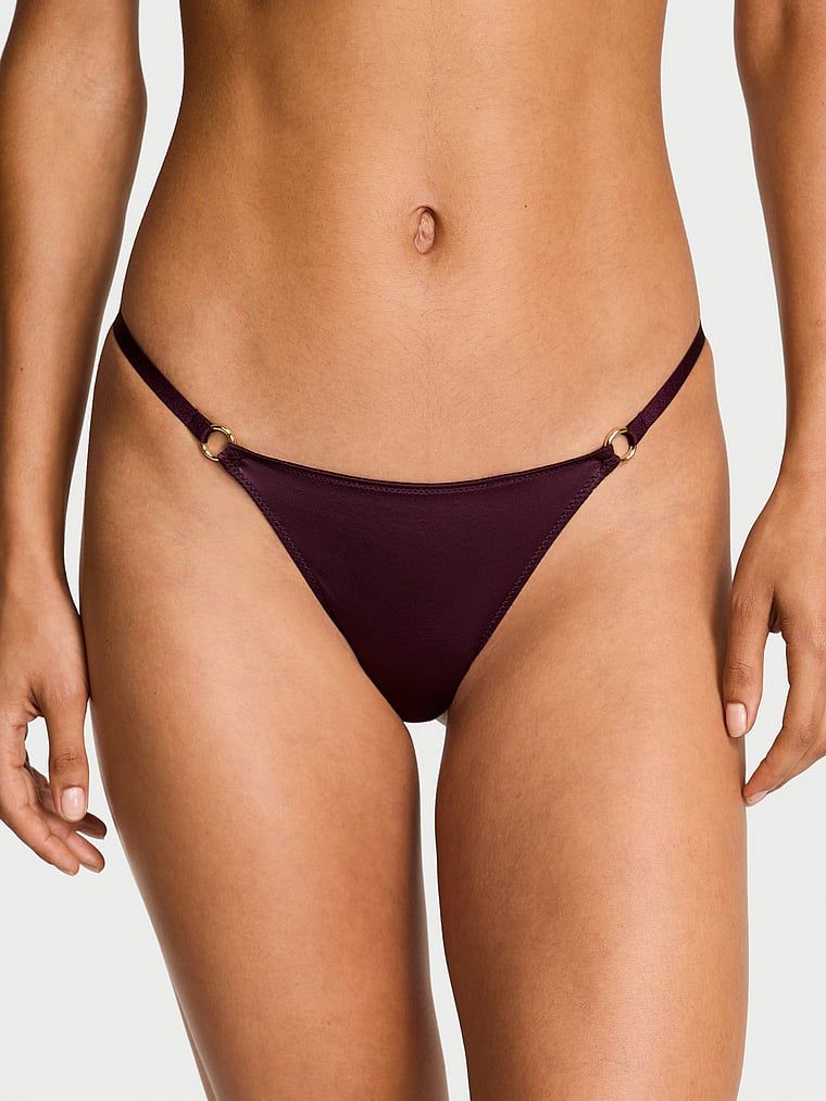 Stringi z kółeczkami Ring Hardware. Produkt ma kolor purpurowy i pochodzi z kolekcji Body by Victoria. 