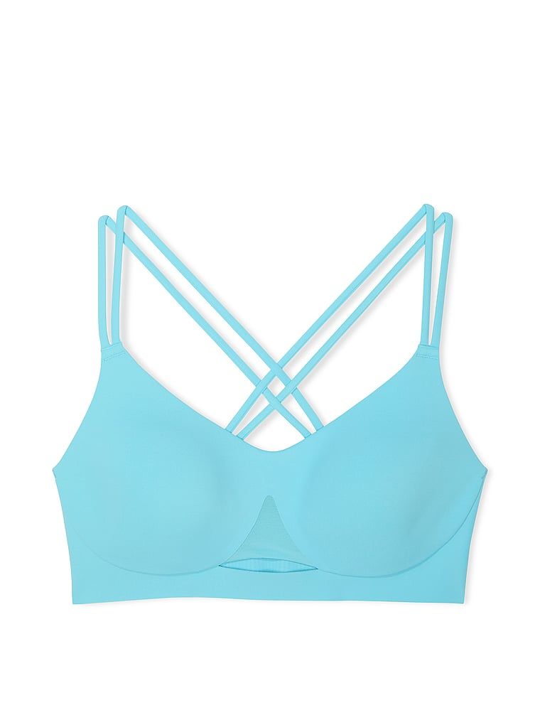 Na zdjęciu na białym tle widoczny jest biustonosz sportowy z lekkim wsparciem Elevate Strappy. Produkt ma kolor niebieski i pochodzi z kolekcji VSX.