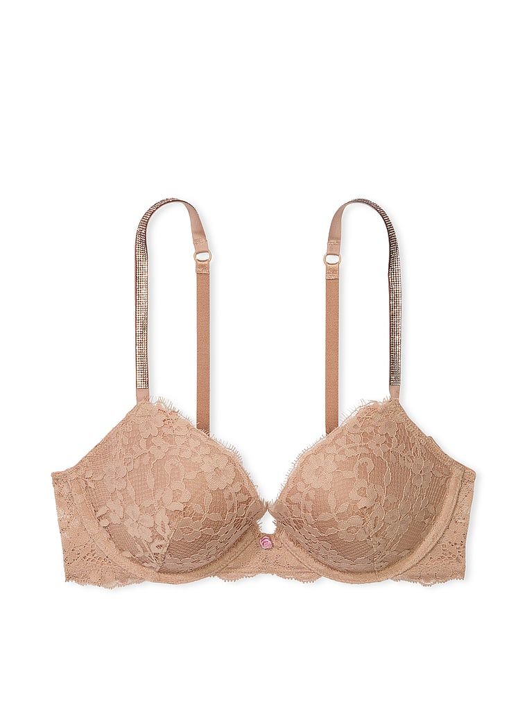 Na zdjęciu na białym tle widoczny jest biustonosz push-up koronkowy z błyszczącymi ramiączkami Twinkle Strap. Produkt ma kolor beżowy i pochodzi z kolekcji Dream Angels.