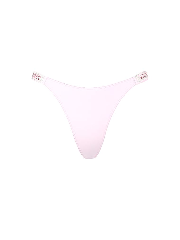 Stringi z błyszczącymi paskami Shine Strap. Produkt ma kolor fioletowy i pochodzi z kolekcji Very Sexy. 