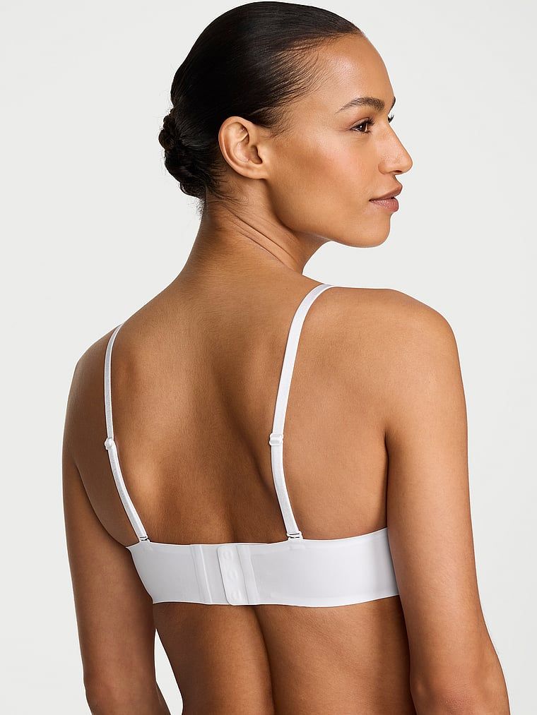 Biustonosz push-up bez ramiączek Strapless. Produkt ma kolor biały i pochodzi z kolekcji Invisible by Victoria's Secret. 