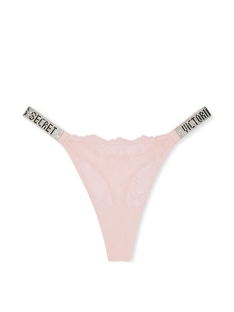 Stringi koronkowe z błyszczącymi paskami Shine Strap Rose Lace. Produkt ma kolor różowy i pochodzi z kolekcji Very Sexy. 