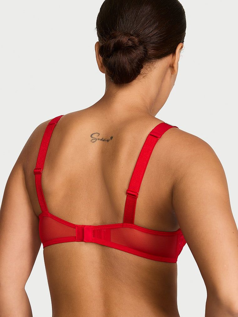 Biustonosz lekko usztywniany koronkowy z błyszczącymi ramiączkami Shine Strap Demi. Produkt ma kolor czerwony i pochodzi z kolekcji Very Sexy. 
