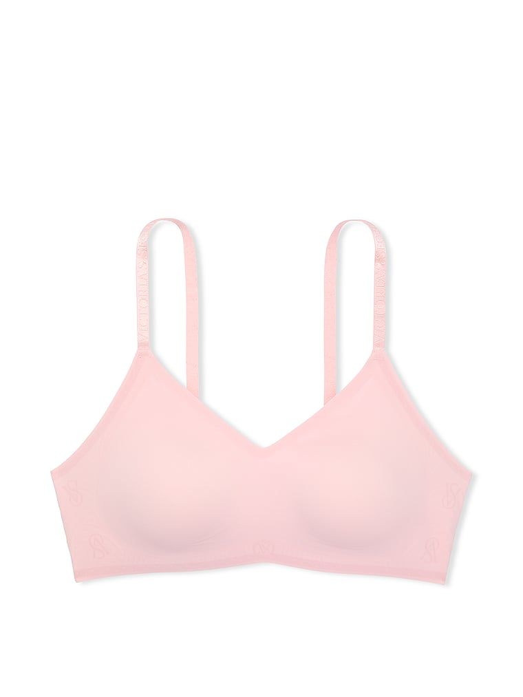 Na zdjęciu na białym tle widoczny jest biustonosz lekko usztywniany braletka bez fiszbin Comfort. Produkt ma kolor różowy i pochodzi z kolekcji Body by Victoria.