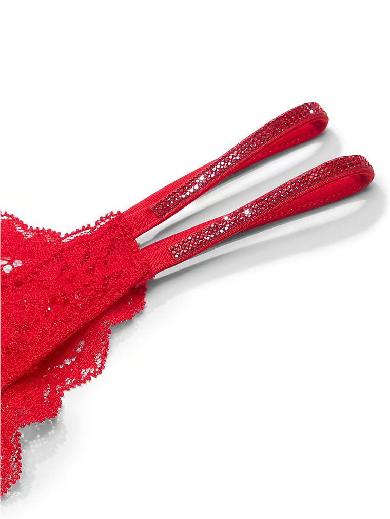 Majtki brazyliany koronkowe z błyszczącymi paseczkami Twinkle Strap Brazilian. Produkt ma kolor czerwony i pochodzi z kolekcji Dream Angels.