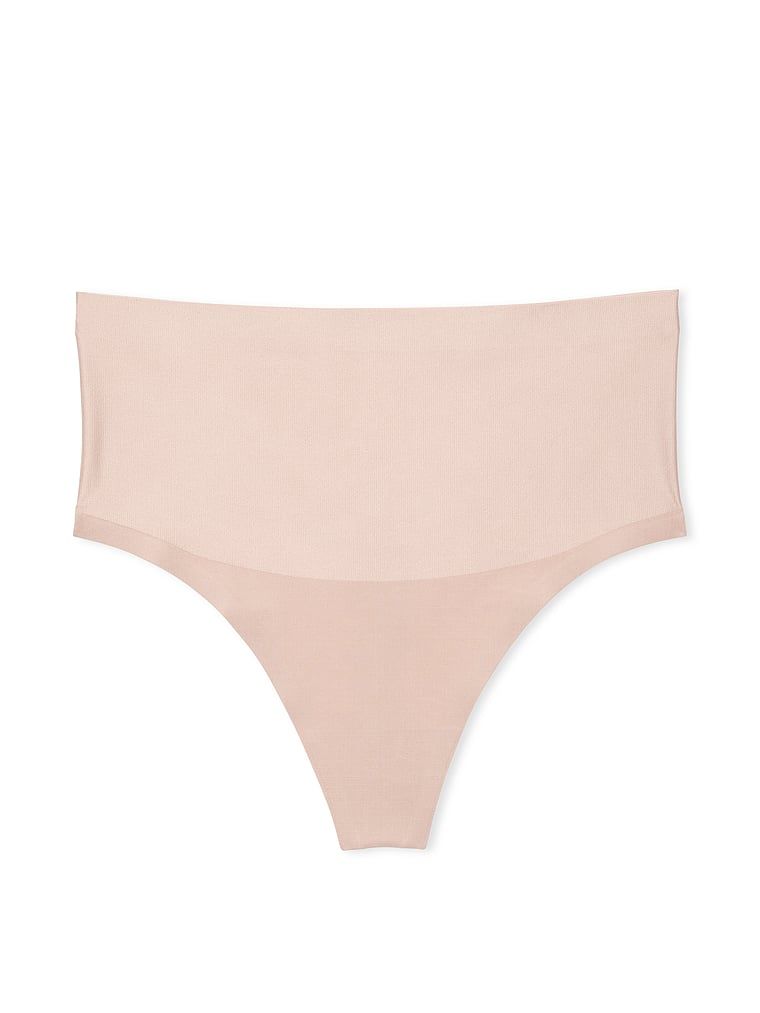 Stringi modelujące z wysokim stanem Smoothing Shimmer. Produkt ma kolor beżowy i pochodzi z kolekcji Body by Victoria. 