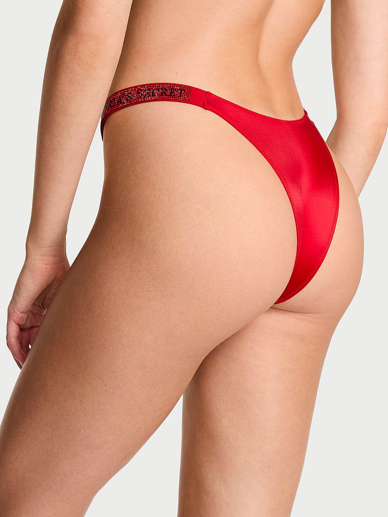 Majtki brazyliany z błyszczącymi paskami Shine Strap Brazilian. Produkt ma kolor czerwony i pochodzi z kolekcji Very Sexy. 
