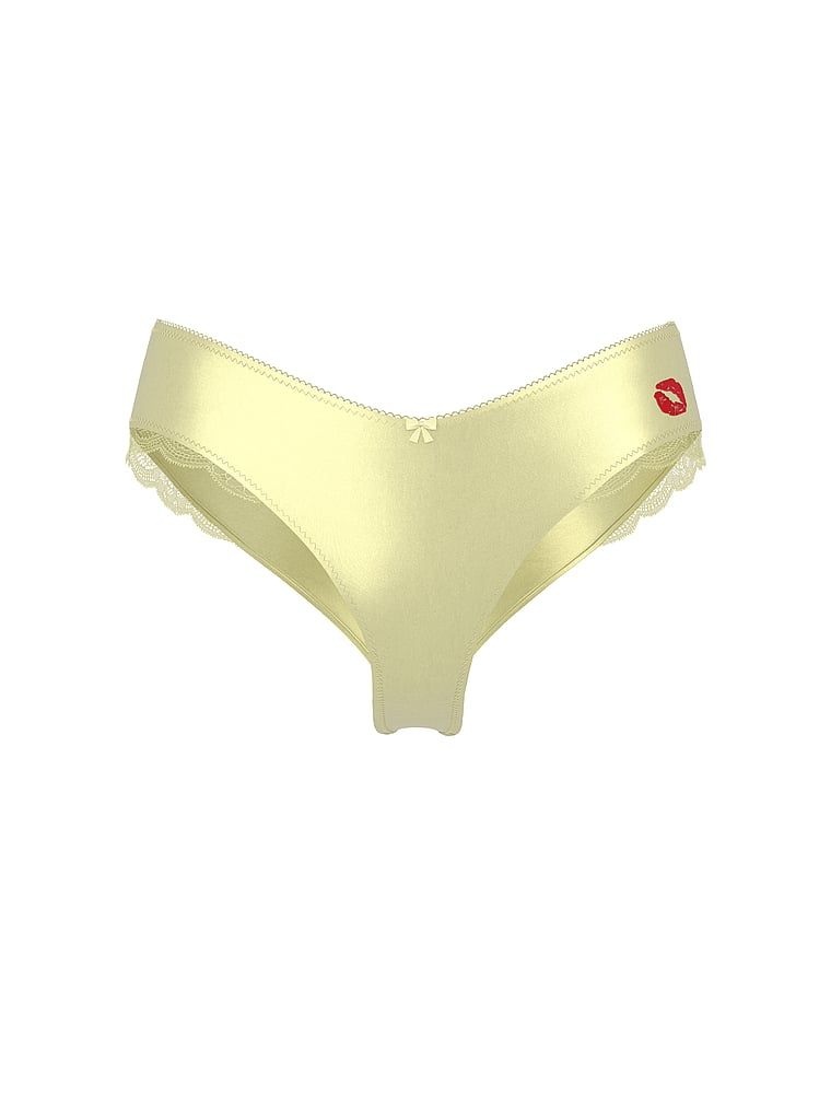 Majtki satynowe z wysoko wyciętymi nogawkami Tease Kiss Cheeky. Produkt ma kolor żółty i pochodzi z kolekcji Victoria's Secret. 