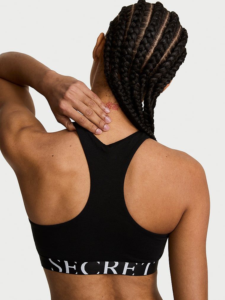 Biustonosz bawełniany braletka Exploded Logo High-Neck. Produkt ma kolor czarny i pochodzi z kolekcji T-shirt. 