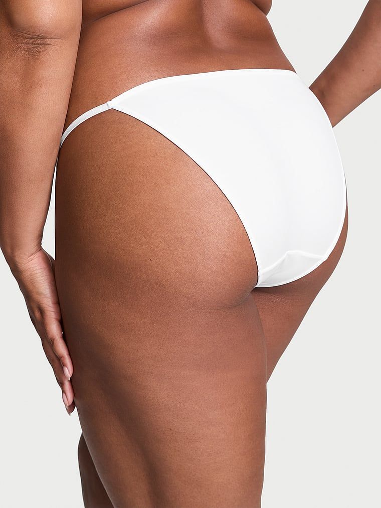 Majtki z regulowanymi paskami Bikini. Produkt ma kolor biały i pochodzi z kolekcji Dream Angels. 