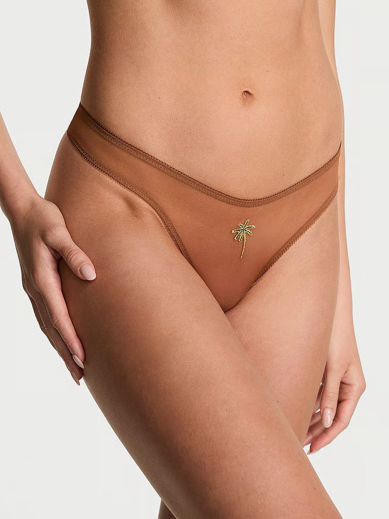 Stringi z siateczki Flirty Mesh. Produkt ma kolor brązowy i pochodzi z kolekcji Very Sexy. 
