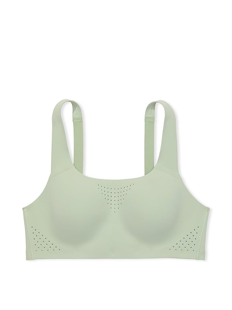 Na zdjęciu na białym tle widoczny jest biustonosz sportowy z maksymalnym podtrzymaniem Featherweight Max. Produkt ma kolor zielony i pochodzi z kolekcji VSX.