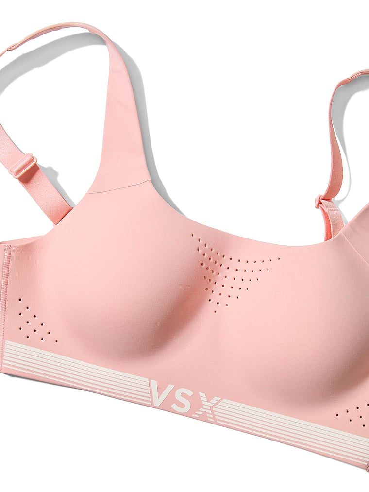 Biustonosz sportowy z maksymalnym podtrzymaniem VSX Featherweight Max. Produkt ma kolor różowy i pochodzi z kolekcji VSX. 