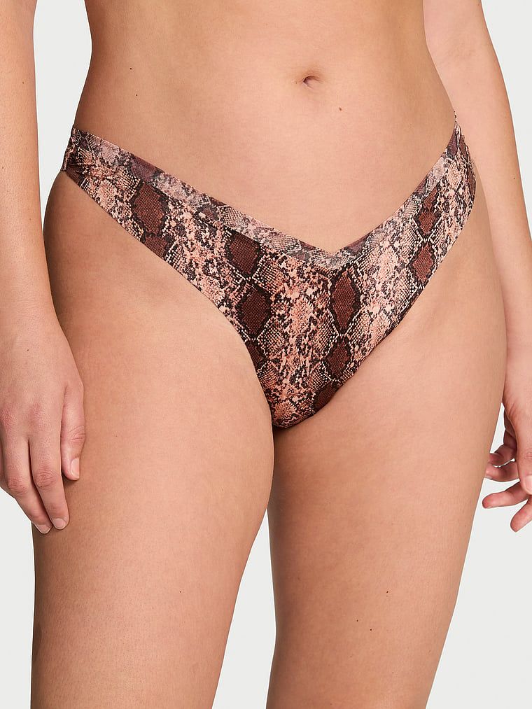 Stringi z paseczkami z tyłu Sheer Reveal. Produkt ma kolor wzorzysty i pochodzi z kolekcji Very Sexy. 