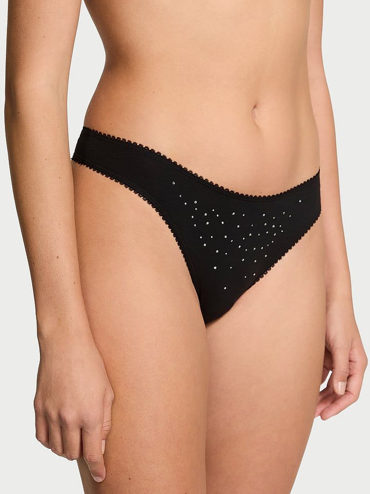 Stringi bawełniane z cekinami Sparkle. Produkt ma kolor czarny i pochodzi z kolekcji Victoria's Secret. 