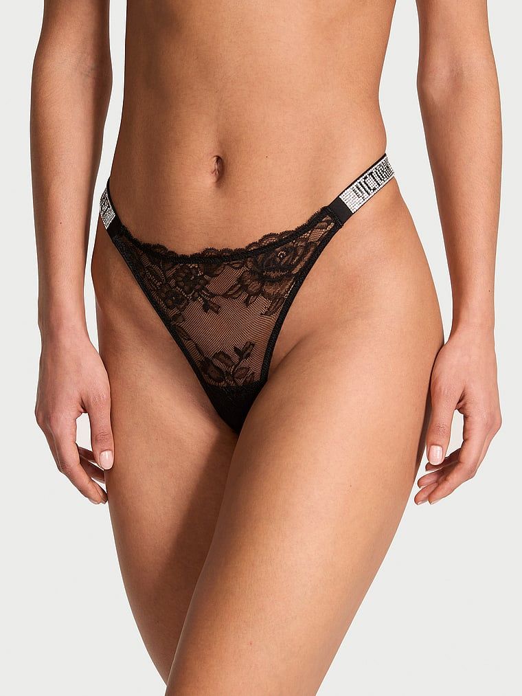 Majtki brazyliany koronkowe z błyszczącymi paskami Shine Strap Brazilian. Produkt ma kolor czarny i pochodzi z kolekcji Very Sexy. 