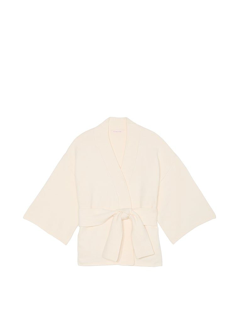 Sweter kopertowy Luxe Creme Knit Wrap. Produkt ma kolor biały i pochodzi z kolekcji Victoria's Secret. 