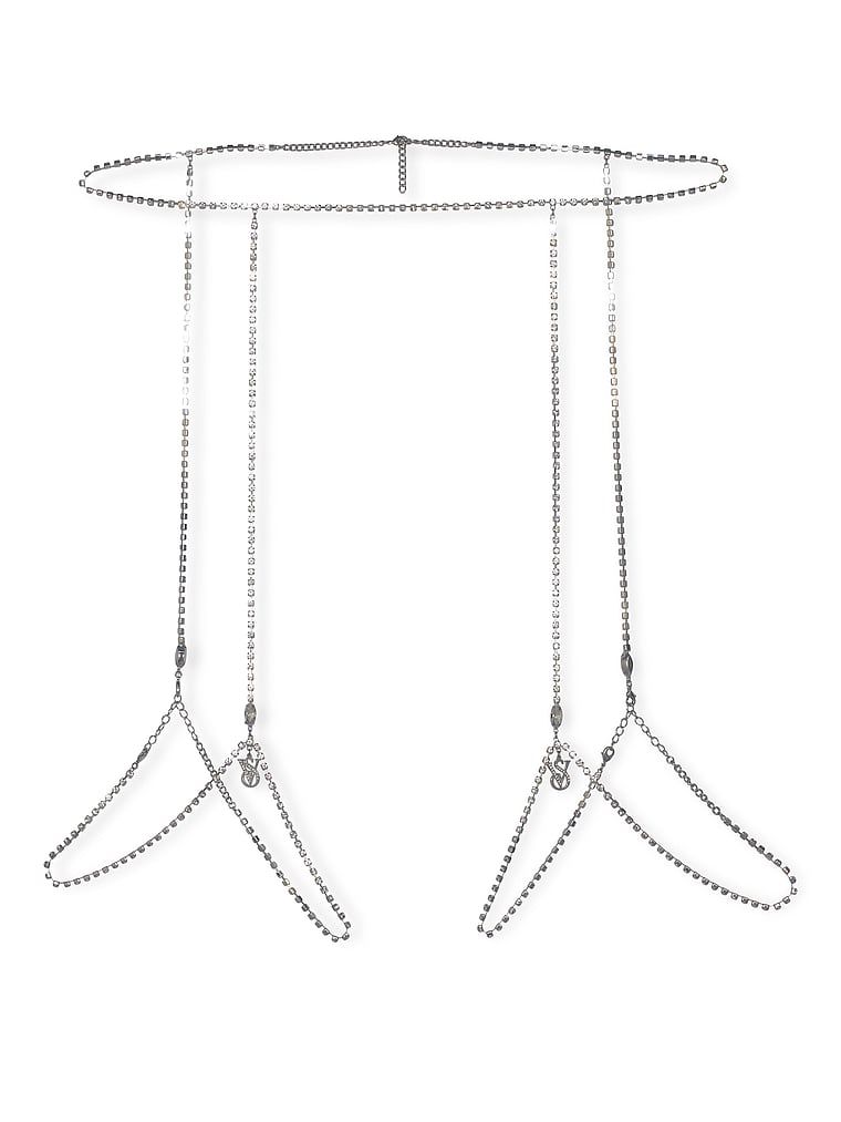 Biżuteria na ciało i do stylizacji - pas do pończoch z kryształków Crystal Shine. Produkt ma kolor wielokolorowy i pochodzi z kolekcji Very Sexy. 