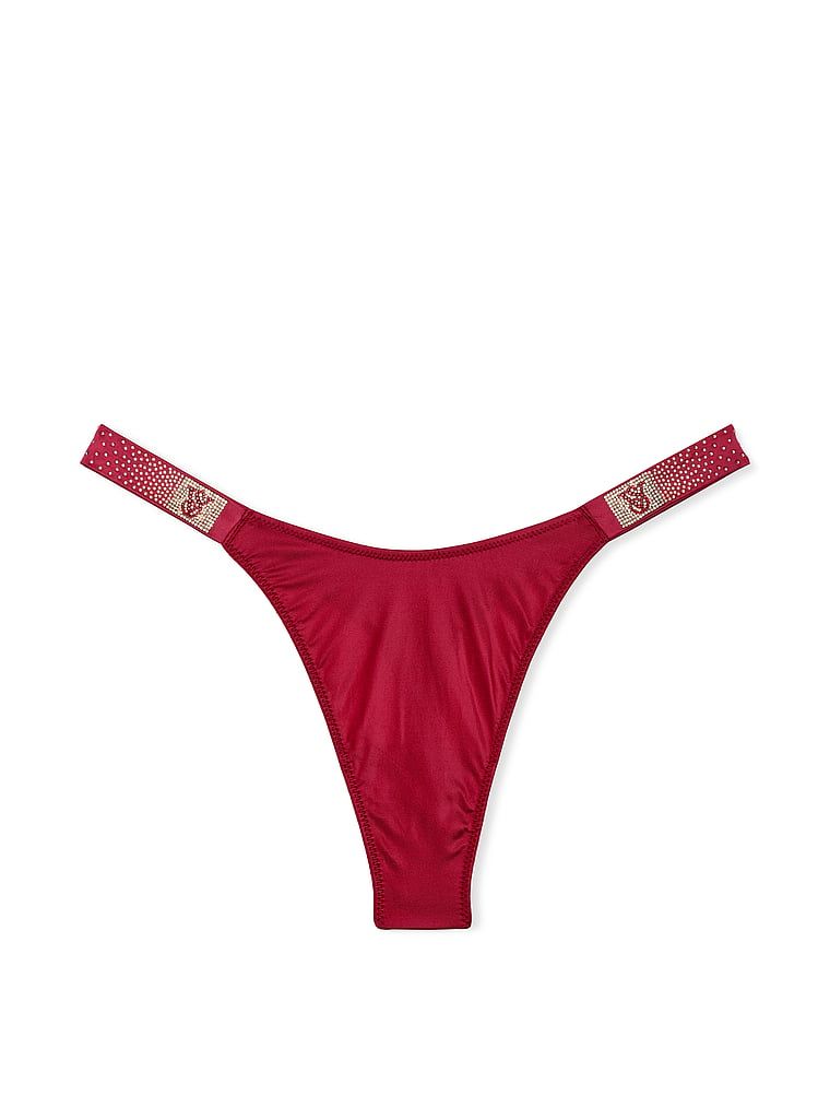 Stringi z błyszczącymi paseczkami Scattered Shine Strap. Produkt ma kolor czerwony i pochodzi z kolekcji Very Sexy. 